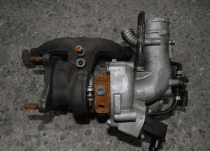 Turbosprężarka skoda octavia ii vw tiguan audi A3 1.8 2.0 tsi 06J145701 1