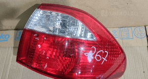 Lampa prawa tył tylna w błotnik mazda 626 gf lift sedan 1
