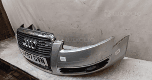 Zderzak przód przedni audi A6 C6 halogeny LY7W srebrny 4