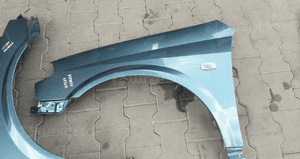 Nissan Primera P12 blotnik przod przedni prawy lew 2