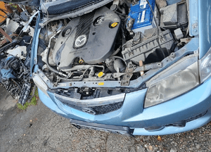 Mazda 323  323f BJ  Premacy Kielich przód przedni mocowanie nadkole 8