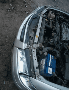 Mazda 626 GF GW 97-02 LIFT    Maska lampa zderzak pas atrapa zamek mocowanie  kolor 4F 4