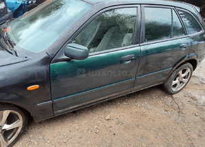 Mazda 323f bj 98-03 Amortyzator  Sprężyna Przedni 3