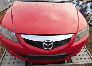 Mazda 6 02-07 Maska lampa zderzak pas atrapa 32G 1