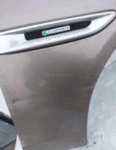 Jaguar xe X760 błotnik prawy przód kompletny 9