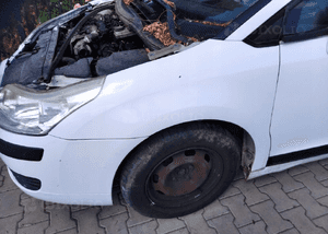 Citroen C4 06 blotnik przod przedni lewy 1