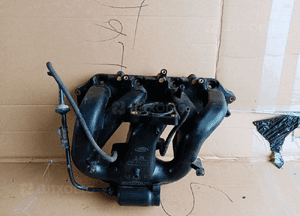 Kolektor ssący Ford Escort MK7 1.6 958-9424-CC 1