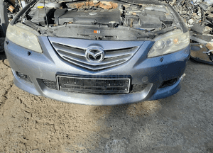 Mazda 6 02-07 Maska lampa zderzak pas atrapa 29Y 4