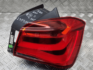BMW F20 F21 LAMPA PRAWA TYŁ TYLNA W BŁOTNIK 7359018 1