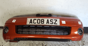 Zderzak przód przedni do nissan note R10 rudy pomarańczowy halogeny 1