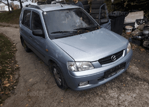 Mazda Demio  99-03 LIFT Maska lampa zderzak pas atrapa 4