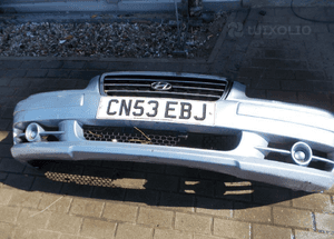 Hyundai trajet  zderzak przód przedni srebrny 2