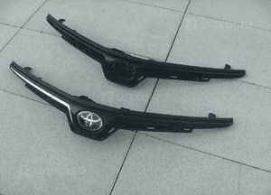 Toyota corolla E21 sedan atrapa zderzaka znaczek oryginał 2