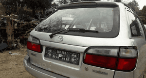 Mazda 626 GW Kombi  Drzwi tylne prawe lewe szyba w kolor  18G 3