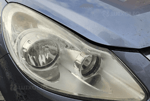 Opel Corsa D lampa przód przednia prawa lewa EU 3