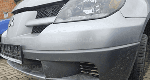 Mitsubishi Outlander I 1 zderzak przód przedni grill  A31 2