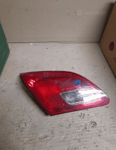OPEL ASTRA J HB Lampa tył lewa w klapę 2