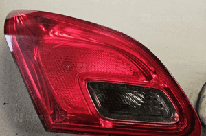 Opel Astra J 4 IV HB lampa tył tylna prawa lewa 1