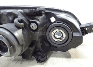 lampa lewa przód TYC Mazda 3 20-a860 8