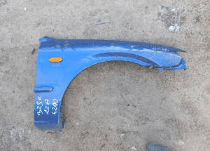 mazda 323F błotnik kolor 22A nr 4210 WYSYŁKA