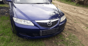 Mazda 6 02-07 Maska lampa zderzak pas atrapa 25E 1