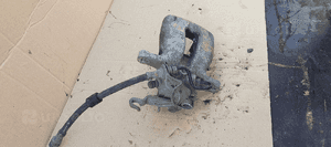 Zacisk hamulcowy lewy tył tylny VW Golf V 2