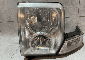 JEEP COMMANDER XK XH LAMPA LEWA ORYGINAŁ UK BDB 1