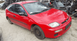 Mazda 323 C ba szyba tylna karoseryjna prawa Lewa 2