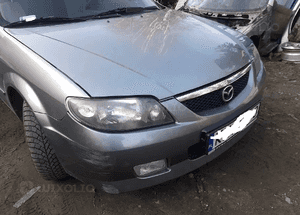 Mazda 323 323f BJ 01-03 Lift  Maska lampa zderzak pas atrapa 22V 1