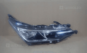 Lampa prawa reflektor toyota corolla E16 lift 16- 1