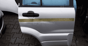 Suzuki Grand Vitara 04 drzwi tyl tylne  lewe 6