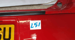 Zderzak tył tylny do mitsubishi colt 6 vi 5D 5 drzwi hb P04 czerwony 2
