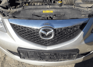 Mazda 6 02-07 Maska lampa zderzak pas atrapa 4