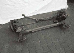 OPEL ASTRA IV J OŚ BELKA ZAWIESZENIE TYŁ 5X115 11