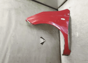 Błotnik lewy przedni przód nissan note Z10 czerwony 2
