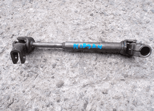 WAŁEK KOLUMNY KIEROWNICZEJ KRZYŻAK NISSAN QASHQAI 06X10B15C 1