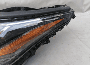 Lampa lewa lewy przód Toyota Highlander 10100-8A06J 2