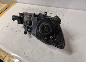 Lampa przednia lewa przód lewo mitsubishi lancer 7 7