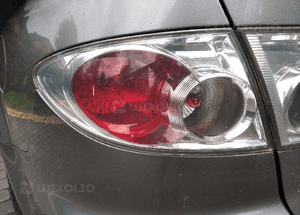 Mazda 6 03 GG lampa tyl tylna w blotnik lewa 5D 1