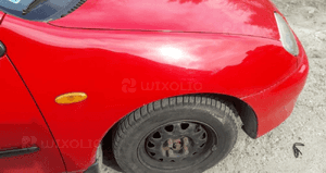 Mazda 323 323C BA Błotnik przedni Prawy SU 2
