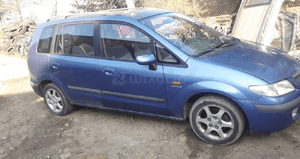 Mazda Premacy Maska lampa zderzak pas atrapa 4Y 6
