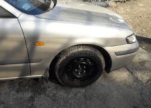 Mazda 626 GF 97-02 błotnik przedni przód Prawy 4f 1