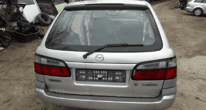 Mazda 626 GW 97-02 KOMBI Zderzak tylny tył pas hak szyba drzwi w kolor 22V 1