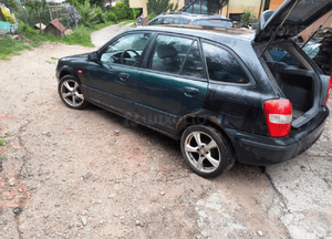 Mazda 323 323f bj 98-03  Zwrotnica piasta lewa prawa przód 3