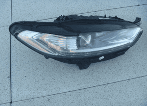 Trójkąt błotnika prawy lewy mondeo MK5 DS73-F16004 11