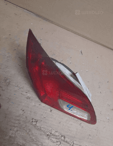 OPEL ASTRA J HB Lampa tył lewa w klapę 2