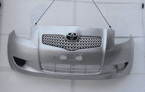 Zderzak przedni przód kompletny TOYOTA YARIS II kolor 1E7 2005-2011 2