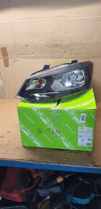 Lampa lewy przód przednia lewa VW Polo IV 6R Nowa TYC 1