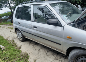Mazda Demio  99-03 LIFT Maska lampa zderzak pas atrapa 11