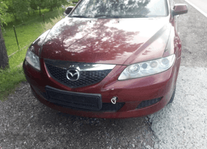 Mazda 6 02-07 Maska lampa zderzak pas atrapa 25H 3